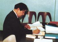 Rev. Teruyuki Tada in his office at a cancer research institute in Buffalo, NY, 1981.
