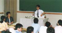 Rev. Mitsuo Kuwada speaking to student seminar on his sericultural research.